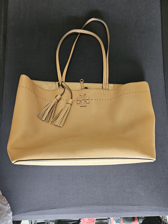 Tory Burch Handbags - Tory Burch Camel Leather Tote with Tassel Charm